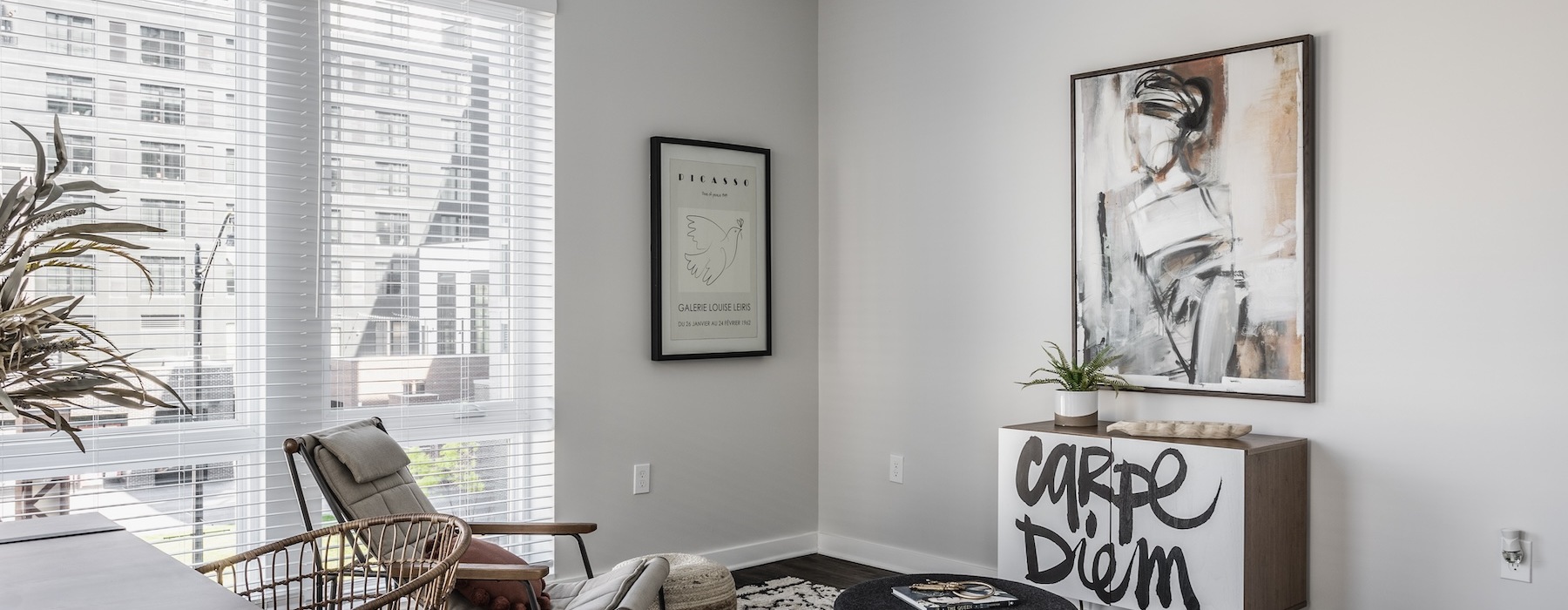 living room with open areas, bright lighting and on wood-style flooring