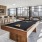 Spacious gameroom with billiards