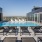 Resort-style swimming pool with lounge seating