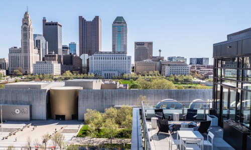 Rooftop lounge area with skyline views